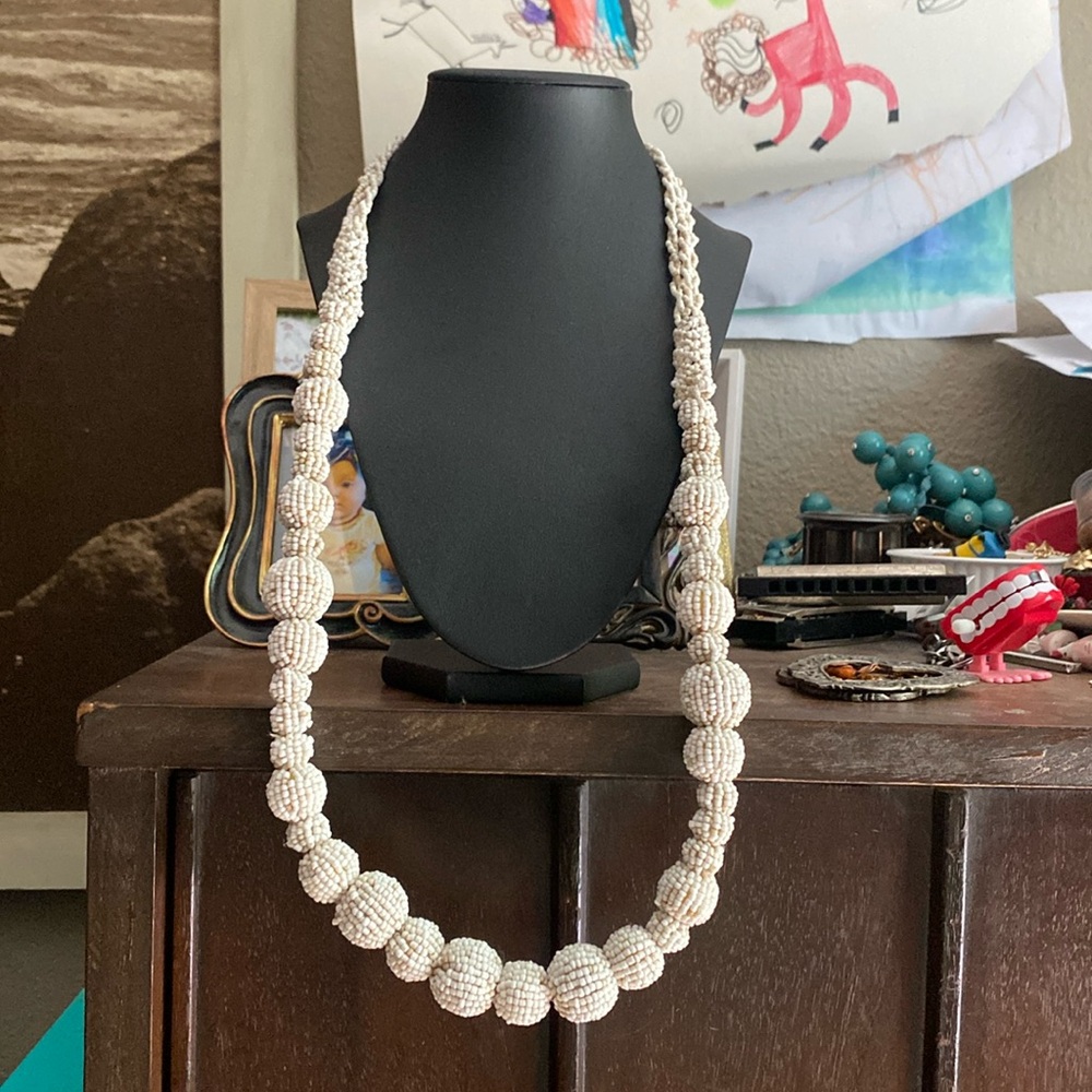 Long beaded necklace.